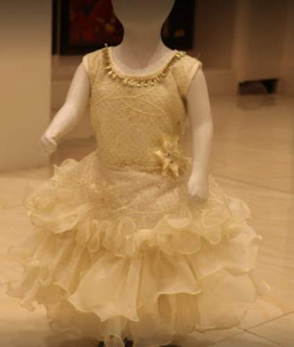 Need Kids Cream Frock At Wholesale Price by Chandana Brothers