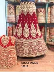 Red Heavy Work Wedding Lehenga