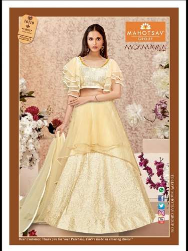 Cream Color Crop top Ruffle Blouse With Lehenga by Manglam Sarees