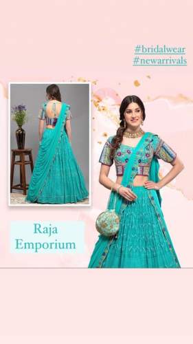 Turquoise Green Embroidered Lehenga Choli by Raja Emporium