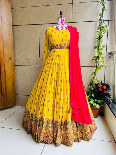 Fully Flared Yellow Embroidered Gown by avira couture
