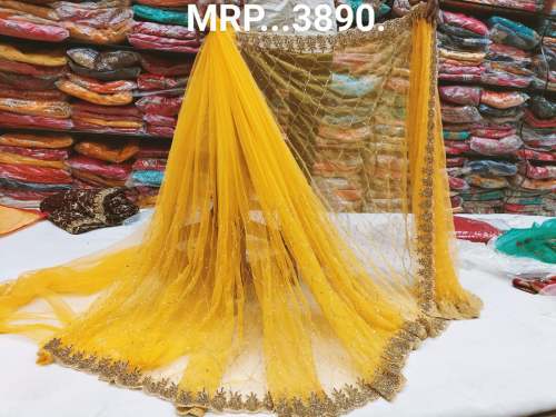 Trendy Yellow net Embroidered Saree 