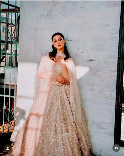 beautiful Kasturi silk lehenga with heavy sequins work