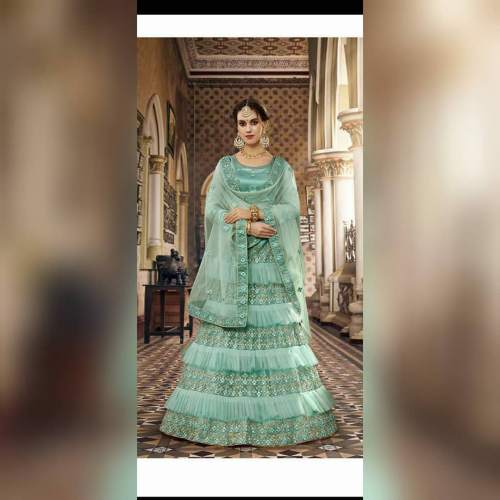 Trending Green Ruffle Lehenga Choli  by Mahabir Bastralaya And Co