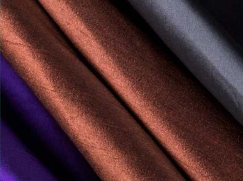 Fancy Plain Silk Faux Dhupion Fabric At Wholesale Rate by Orbit Exports Limited
