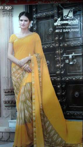 Fancy Georgette Yellow Printed Saree by Mahalaxmi Life Style