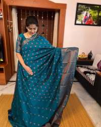 Teal color Banarasi Soft Silk Saree With Matching Blouse