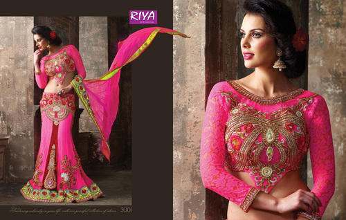 Designer wedding wear lehenga  by Riya Designers