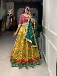 Mustard Colored Wedding Wear Patola Lehenga Choli