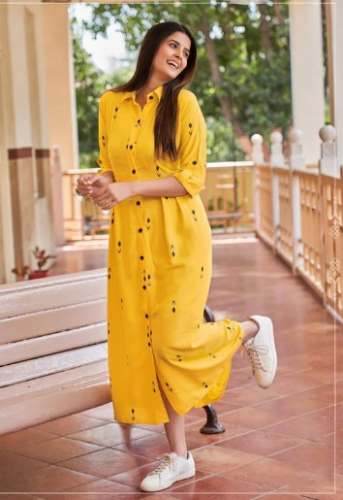 Daily Wear Yellow Rayon Printed Kurtis by Kalaakaari