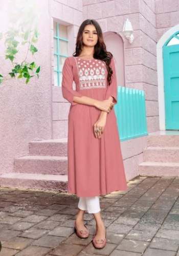 Ladies Attractive Peach Embroidered Neck Work Kurtis by Kalaakaari