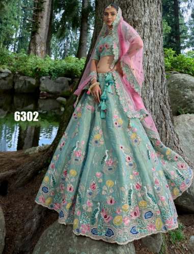Multi Color Heavy Embroidery Jarkhan And Sequence Work Lehenga Choli by Tanvi Fashions