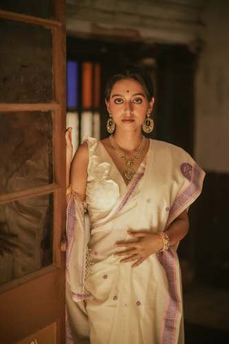 Handwoven Chalchitra Pink Purple Jamdani Saree in White base by Katha A Tale Weaves