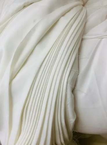 Creme Polyester Crape Fabric by Tulsi International