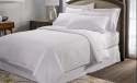 plain-white-hotel-bed-sheet