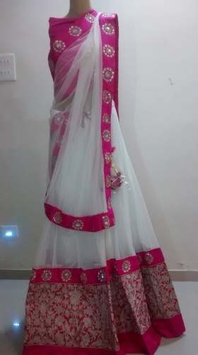 Party wear Net Ghagra Choli by Mystique Creations