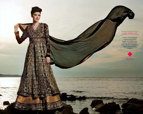 Designer Heavy Embroidered Semi Stitched Suit  by Swastika Group