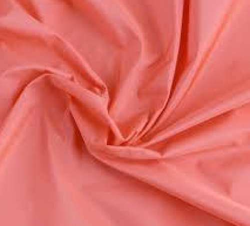 saffron polyester fabric by Radhika Fabrics